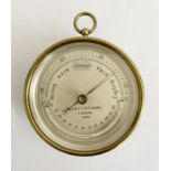 20th century brass cased compensated aneroid barometer produced by Short & Mason of London, the dial