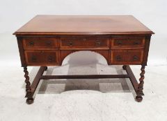 Modern walnut desk, the rectangular top with moulded edge above five assorted drawers, on