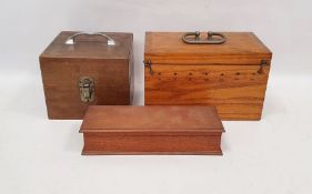 Oak box with hinged chamfered lid and brass drop handle, previously used for some electrical