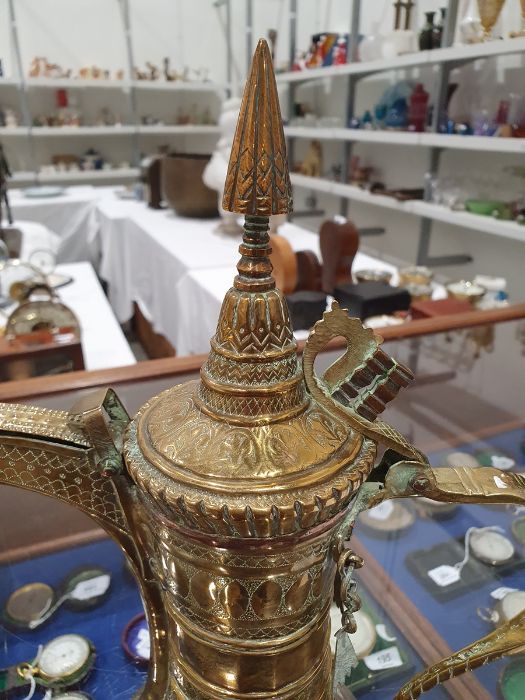 Middle Eastern brass tray, a dallah brass coffee pot, a pair of brass bowls, a vase and a large - Image 4 of 43