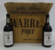 Twelve bottles of Warre's 1975 Vintage port in original box (12)