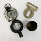 Vintage military compass marked T G Co Ltd. London, numbered B310208 MKII 1944 with a small brass