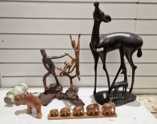 Large mid century model of gazelle suckling calf, two stylised carved wood figural ornaments, a