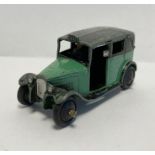 Playworn Dinky diecast car 36g taxi with driver green body, black wheels and top