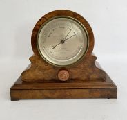 Burr walnut cased mantel aneroid barometer by H Hughes, late 19th/early 20th century, the silvered