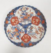 Imari fluted circular dish, 19th century, painted in gilt with flowering prunus, chrysanthemum and