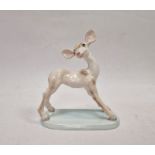 Wedgwood & Co mid- 20th century handpainted pottery fawn, on pale blue oval base, 15.5cm high