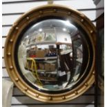 Reproduction Georgian-style circular convex mirror with decoration to the frame, 57cm diameter