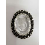 19th century gilt metal and intaglio carved oval brooch, depicting female classical profile head,