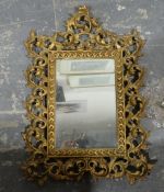 Rococo-style mirror with gilt metal scrolling acanthus leaf frame, with rectangular glass plate,