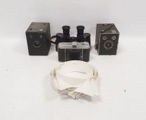 Assortment of vintage cameras and binoculars to include a Retina by Kodak camera, a box camera,