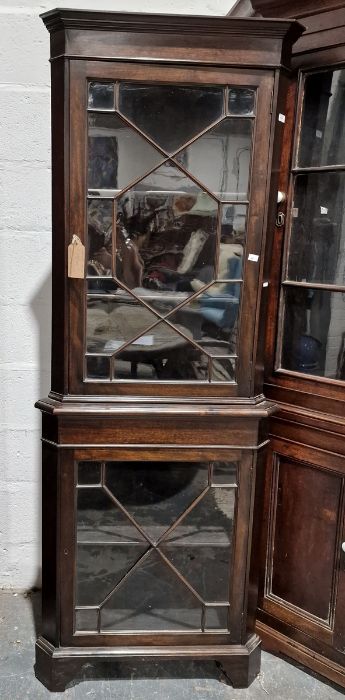 20th century corner display cabinet, the moulded cornice above astragal-glazed door enclosing