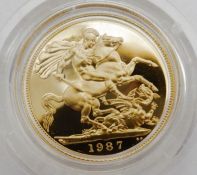 1987 gold proof sovereign in case Condition ReportSee photos for relevent paperwork/COA's that