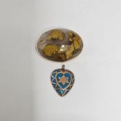 Gold and turquoise stone heart-shaped pendant and a gold-mounted polished oval brooch, unmarked (2)