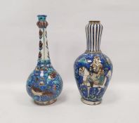 Two 19th century Persian Kajar Dynasty pottery vases, the first bottle-shaped painted with birds