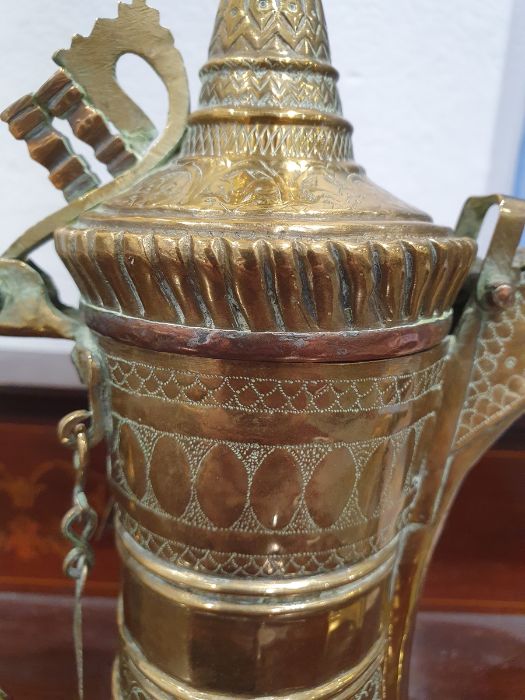 Middle Eastern brass tray, a dallah brass coffee pot, a pair of brass bowls, a vase and a large - Image 16 of 43