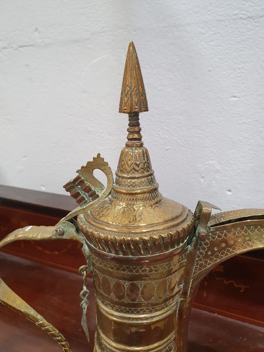 Middle Eastern brass tray, a dallah brass coffee pot, a pair of brass bowls, a vase and a large - Image 9 of 43