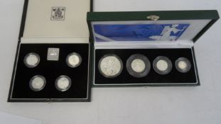 Two boxed silver proof coin collections to include 2001 Britannia collection of four coins and