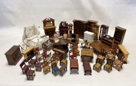 Large collection of wooden dolls house furniture to include piano, metal double bed with bedding,