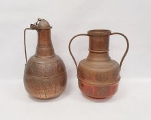 Middle Eastern copper ewer, with hammered design, a single handle, 48cm high approx with a Middle