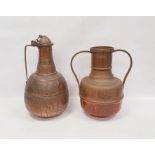 Middle Eastern copper ewer, with hammered design, a single handle, 48cm high approx with a Middle