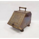 Coal scuttle with Arts & Crafts style decoration, rivets, fall-flap front supported on four bun feet