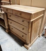 Pine chest of two short over three long drawers, with column pilasters, 96cm x 119cm x 57cm