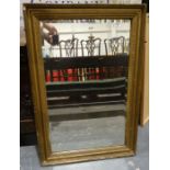 Rectangular mirror with bevelled edge plate in moulded frame, 89.5cm x 61cm and one further