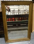 Rectangular mirror with bevelled edge plate in moulded frame, 89.5cm x 61cm and one further