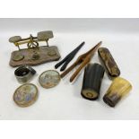 Small set of postal scales, two glove stretchers, two horn beakers, a tortoiseshell-backed clothes