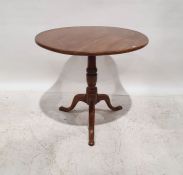 19th century mahogany tripod table, the circular top on turned pedestal, to tripod base, 70cm x 79cm