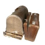 Singer sewing machine housed in wooden case, serial number 10565535, a small leather suitcase and
