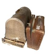 Singer sewing machine housed in wooden case, serial number 10565535, a small leather suitcase and