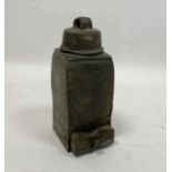 An unusual lead object, with a screw lid and handle and a small drawer below, 14cm high, 5.5cm