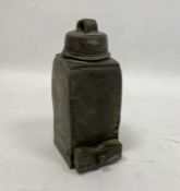 An unusual lead object, with a screw lid and handle and a small drawer below, 14cm high, 5.5cm