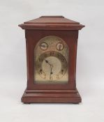 Bracket-type clock in mahogany case, on bun feet, the brass rectangular dial with Arabic numerals