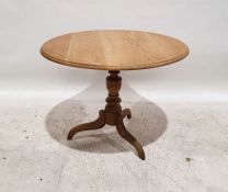 20th century oak circular breakfast table on turned pedestal to tripod base, 68cm x 88cm