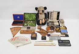Assorted collectables to include boxed slide rules, playing cards, vintage pencil box, boxed