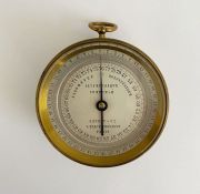 Late 19th/early 20th century French gilt-metal cased pocket barometer produced by Naudet & Cie,