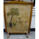 20th century oak-framed firescreen with painted decoration, 77cm high x 56cm wide