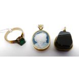 9ct yellow gold pendant set with blue and white cameo bust, an onyx pendant set in gold mount and