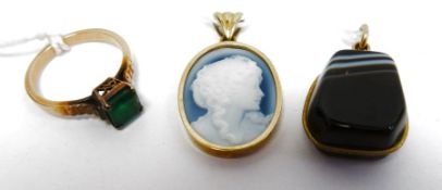 9ct yellow gold pendant set with blue and white cameo bust, an onyx pendant set in gold mount and