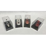 Four cased diecast model cars to include Norev Honda F1 RA 272, Ebbro 740 Porsche 908 Long Tail Le