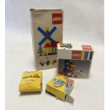 Two boxes of Lego to include a 1976 boxed set and Legoland dominoes