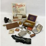Quantity of cigarette lighters to include a boxed Ronson and assorted others, a bakelite container