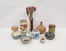 Collection of 20th century studio pottery including a tall mast headed vessel, indistinctly
