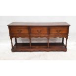 Modern oak three-drawer sideboard in the 18th century manner, the rectangular top with moulded