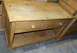 Pine side table, the rectangular top with single drawer and open recess, on bun feet, 70cm x 110cm x