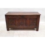 Possibly 17th century and later oak coffer, the rectangular top with moulded front edge, above three