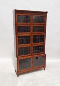 20th century Minty mahogany and satinwood crossbanded sectional bookcase with leaded glazed doors,